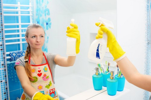 Commercial cleaning team working in a Stjohnswood office reception area