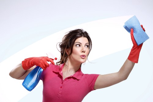 Steam cleaning a high-traffic carpeted area for a local business